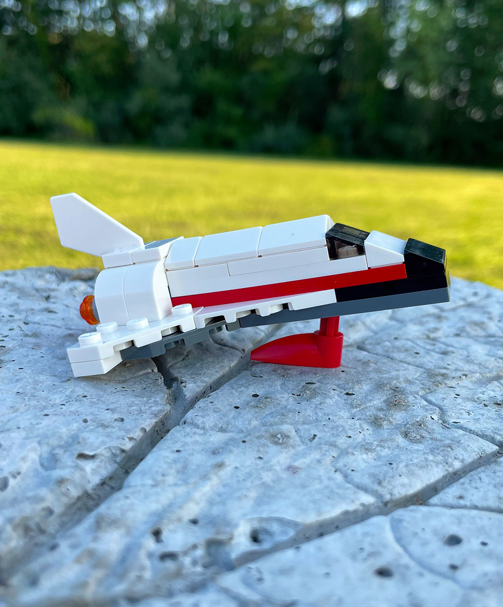 A LEGO Space explorer shuttle about to take off.